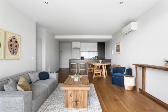 a living room with a couch and a table