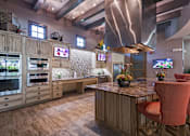 Thumbnail 22 of 45 - Clubhouse Kitchen at Orchid Run Apartments, Naples, FL, 34105