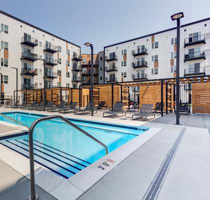take a dip in the resort style pool at the conrad near unmc in the black