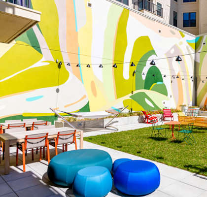 A colorful mural on the wall of a building.
