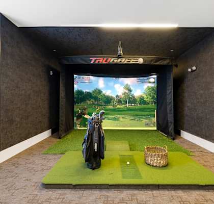 A golf simulator room with a TRUUiBE screen. at Indigo 301, King of Prussia