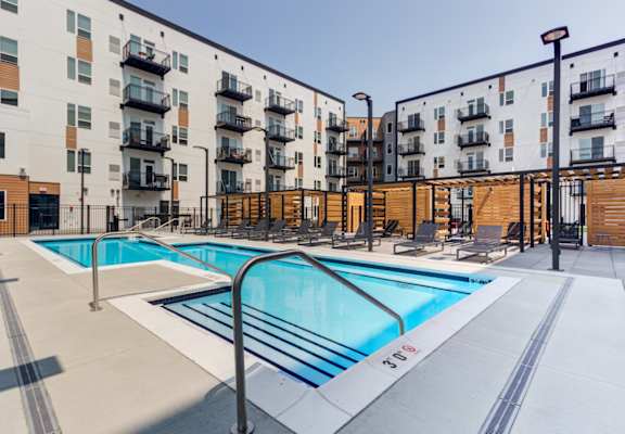 take a dip in the resort style pool at the conrad near unmc in the black