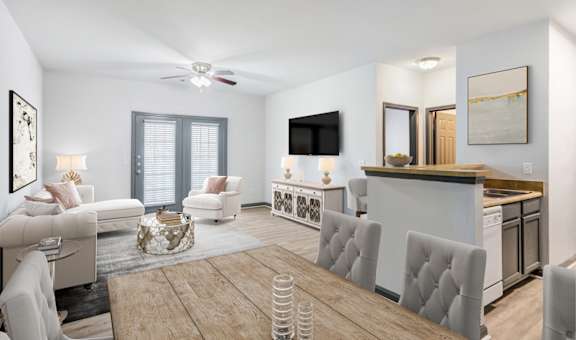 Parc at Metro Center Apartments in Nashville, TN photo of a living room and dining room with a table and chairs