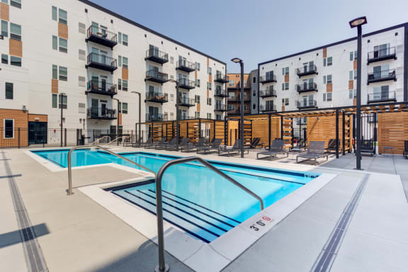 take a dip in the resort style pool at the conrad near unmc in the black