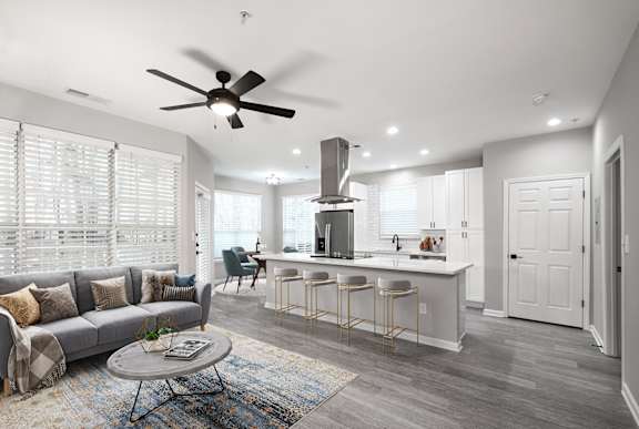 Legacy units feature quartz countertops, matte black finishes and stainless steel appliances