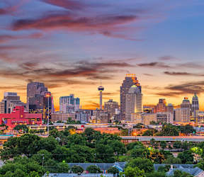 a view of the city at sunset