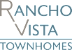 A black background with white and grey text that reads Rancho Vista Townhomes.