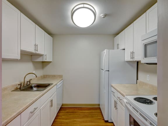 One bedroom apartment kitchen at Rockingham Glen in West Roxbury, MA