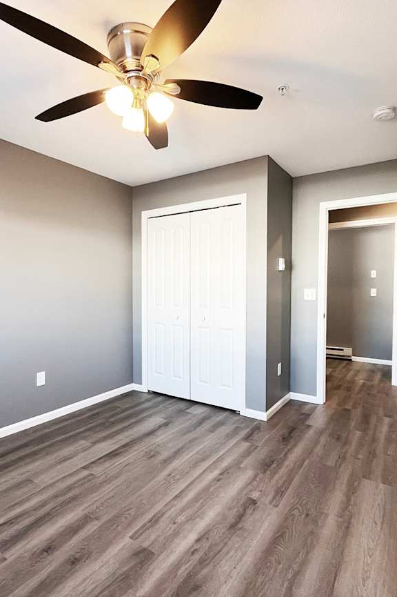 a bathroom with a toilet and a sink and a bath tub