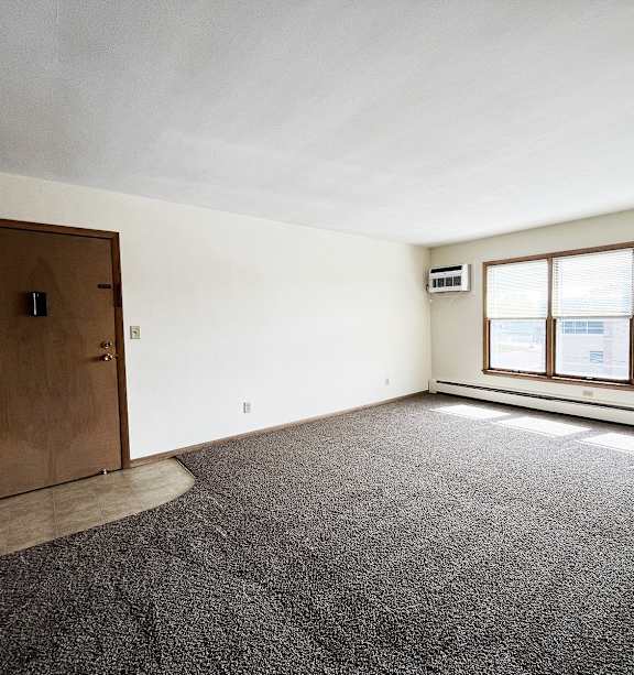 a bedroom with a bed and a ceiling fan