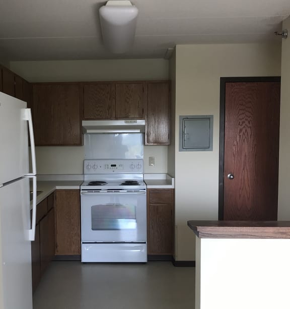 a bedroom with a bed and a ceiling fan
