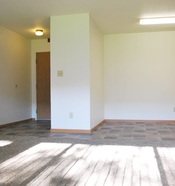 a bedroom with a bed and a ceiling fan