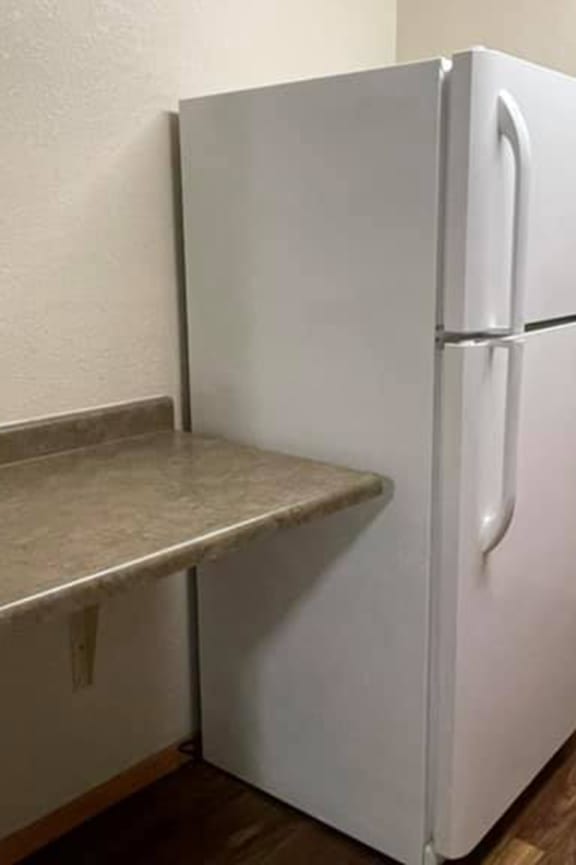 a bathroom with a toilet and a sink and a bath tub