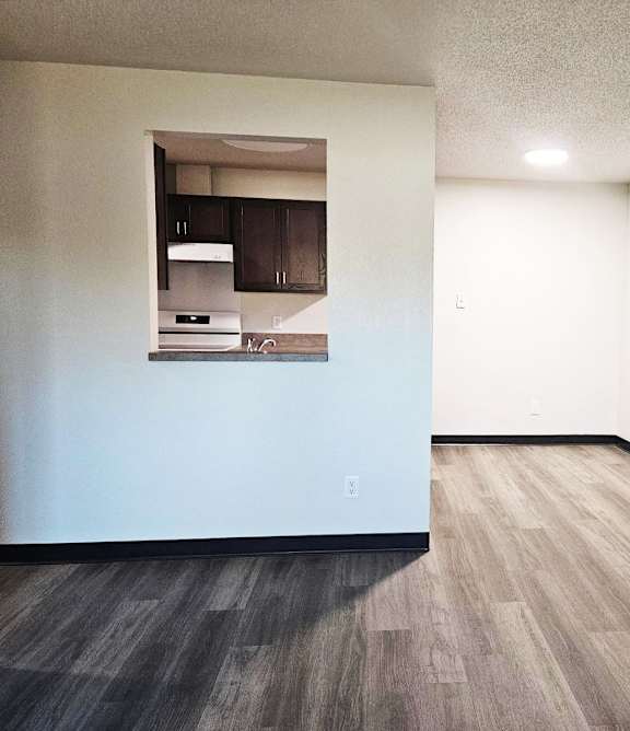 a living room with a couch and a chair and a table