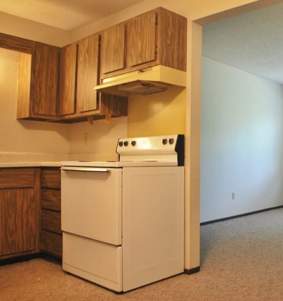 a bedroom with a bed and a ceiling fan