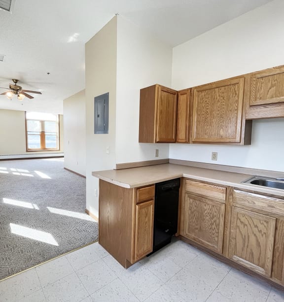 a bedroom with a bed and a ceiling fan