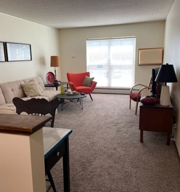 a bedroom with a bed and a ceiling fan