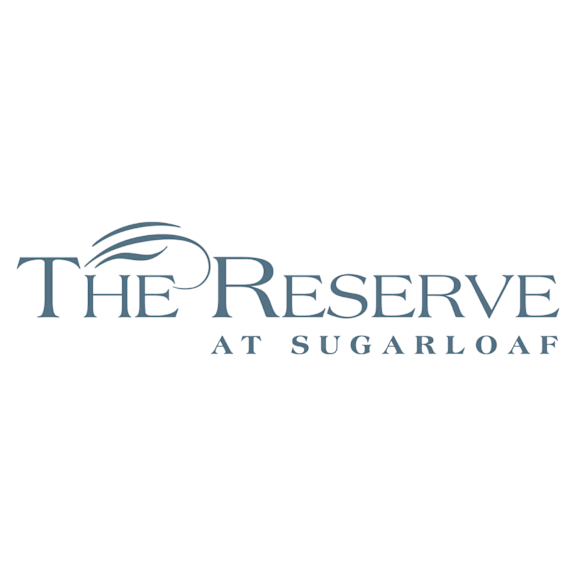 A logo that says The Reserve at Sugarloaf.