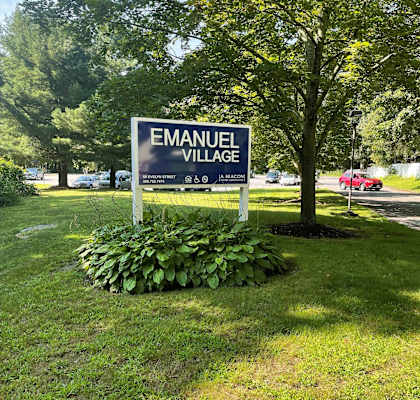 Sign Monument on Beautiful Landscaped Lawn Emanuel Village. at Emanuel Village Apartments, Worcester, 01607