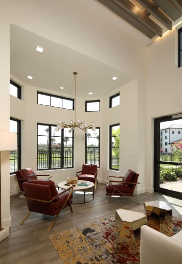 Beautiful ceiling lights in modern living room with dining at Azola West Palm Beach, West Palm Beach, FL, 33411