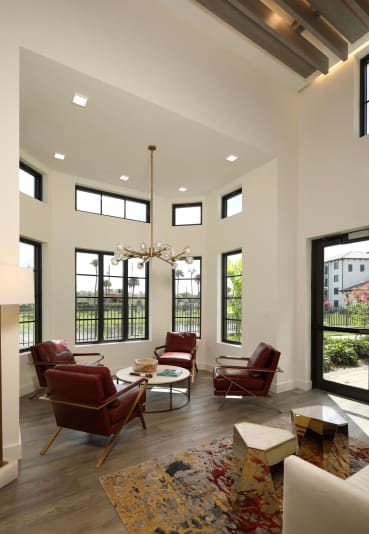 Beautiful ceiling lights in modern living room with dining at Azola West Palm Beach, West Palm Beach, FL, 33411