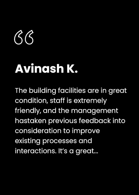 A review from Avinash K. praises the building facilities, staff friendliness, and management's responsiveness to feedback.