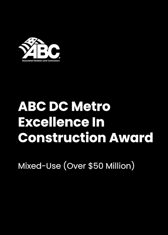 A black poster with the ABC logo and the words ABC DC Metro Excellence In Construction Award.