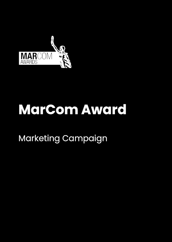 A black and white image of a MarCom Award logo.