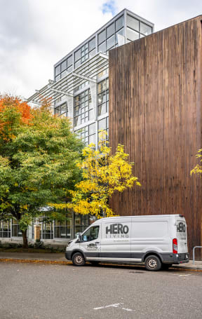 a hero van parked in front of a building