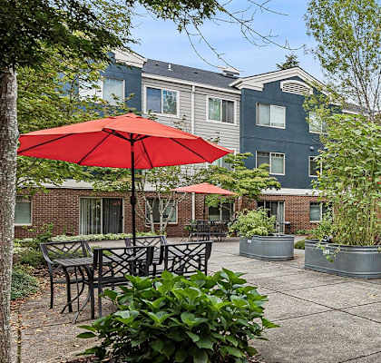 Community courtyard and garden at Woodrose Senior Affordable Apartments in Bellingham WA