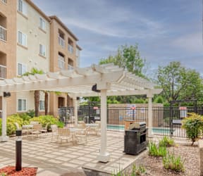 Outdoor Seating and Grilling Space at Hayward Village Senior Apartments