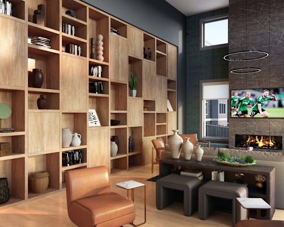 A living room with a fireplace and a television.