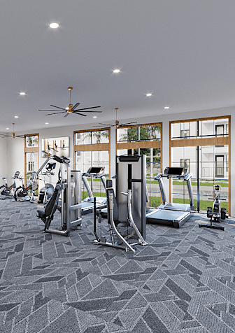 a gym with a variety of exercise equipment and windows