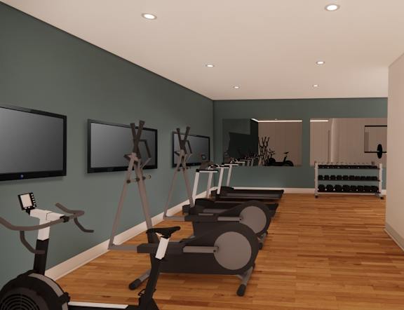 A room with a row of exercise bikes and a mirrored wall.