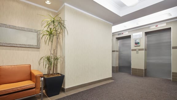 View of the well-lit elevator foyer