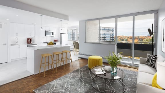 Modern suite kitchen with stainless steel appliances and quartz countertops