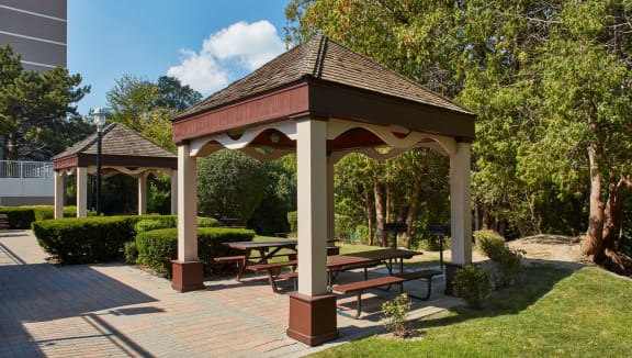Outdoor picnic area covered by large gazebo