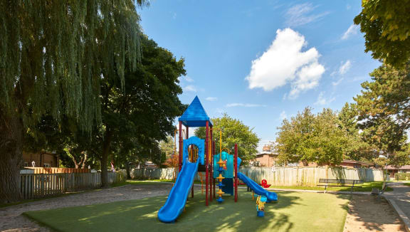 Children's playground located on grass