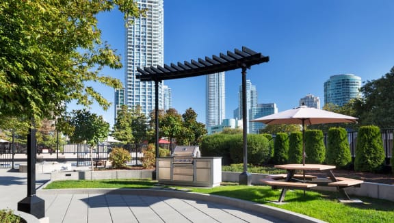 View of the outdoor social area, complete with barbeque for your use.