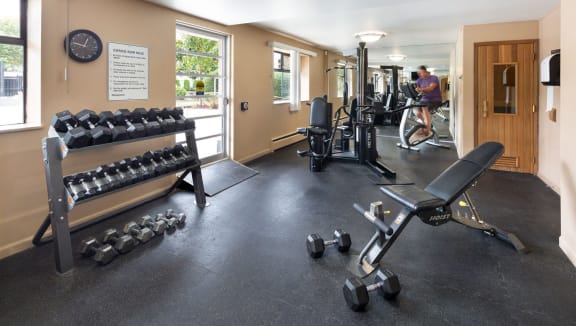 The fitness centre, well-lit and full of equipment.