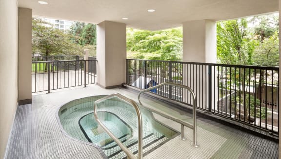 The luxurious hot tub is out door and undercover.