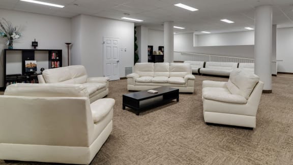 Social room with comfortable couches, and lots of room to relax
