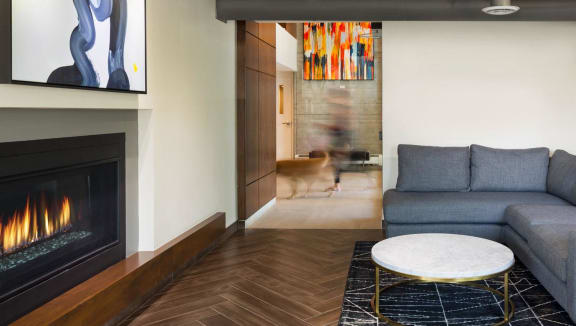 Lobby with a seating are and a large fireplace