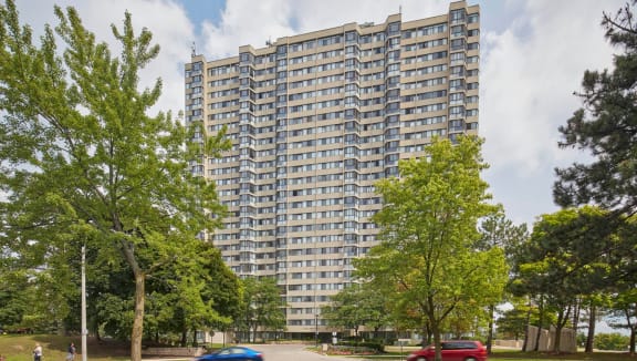 8 Silver Maple building exterior surrounded by trees.