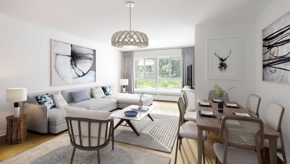 Staged living area with modern furniture and lots of natural light