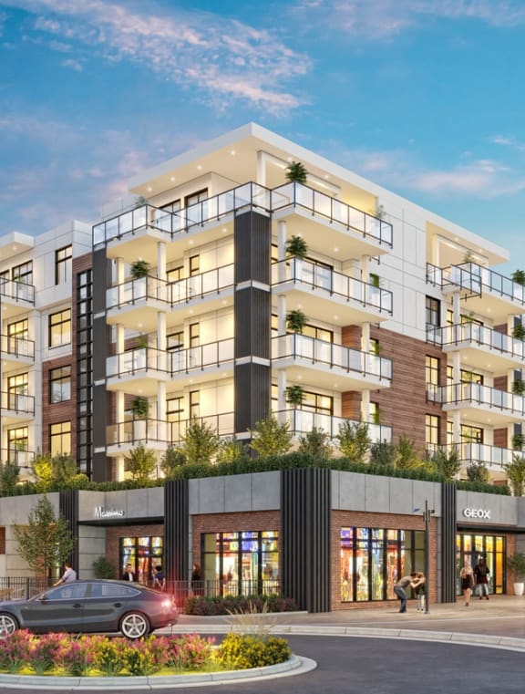 a rendering of an apartment building on a city street