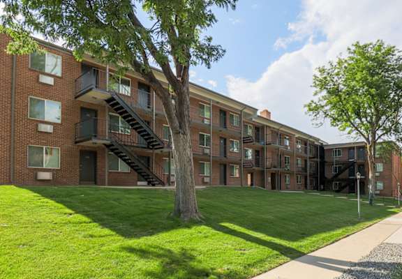 our apartments offer a spacious courtyard with green grass at The Wesley Apartments, Denver, CO 80222