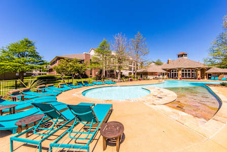 resort-style pool with spacious sundeck and available Wi-Fi
