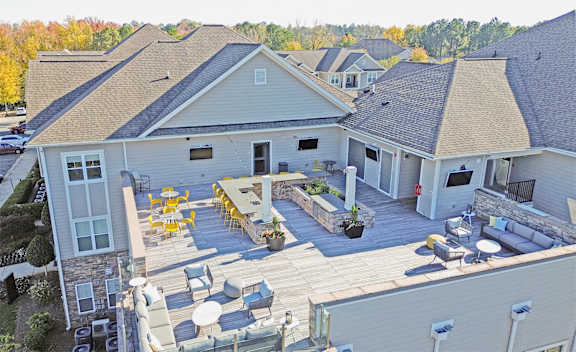 Rooftop clubhouse terrace with bar