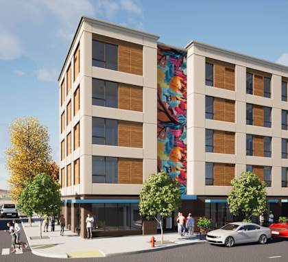 a rendering of the building with a colorful mural on the side of it